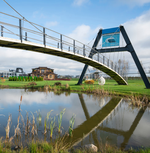 EcoTechnoPark, Maryina Gorka, 2019. String bridge over a pond by uST technology EcoTechnoPark, Maryina Gorka, 2019. String bridge over a pond by uST technology