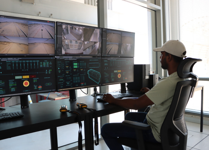 uSky Test & Certification Center, Sharjah (UAE), 2020. Control room (left) and string transport passenger station (right) uSky Test & Certification Center, Sharjah (UAE), 2020. Control room (left) and string transport passenger station (right)